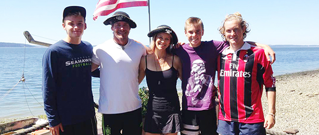 Erik and Tasha Wahl pose for a photo with their three sons.