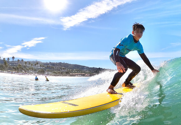 Surfing boy