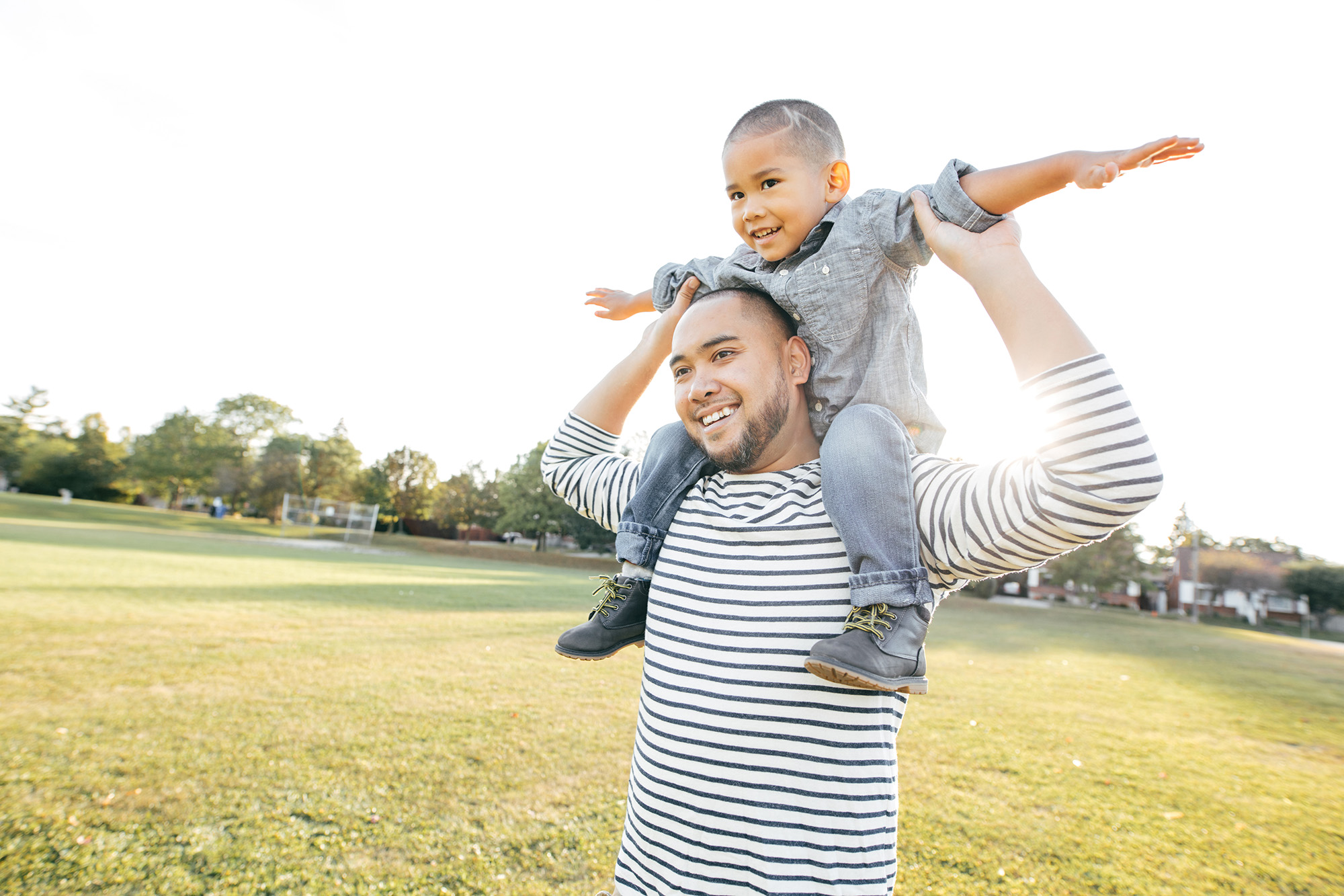 Father and son at park