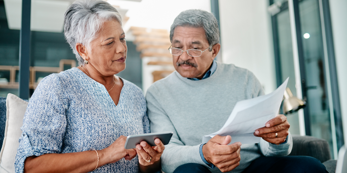 Couple assesses their finances at home