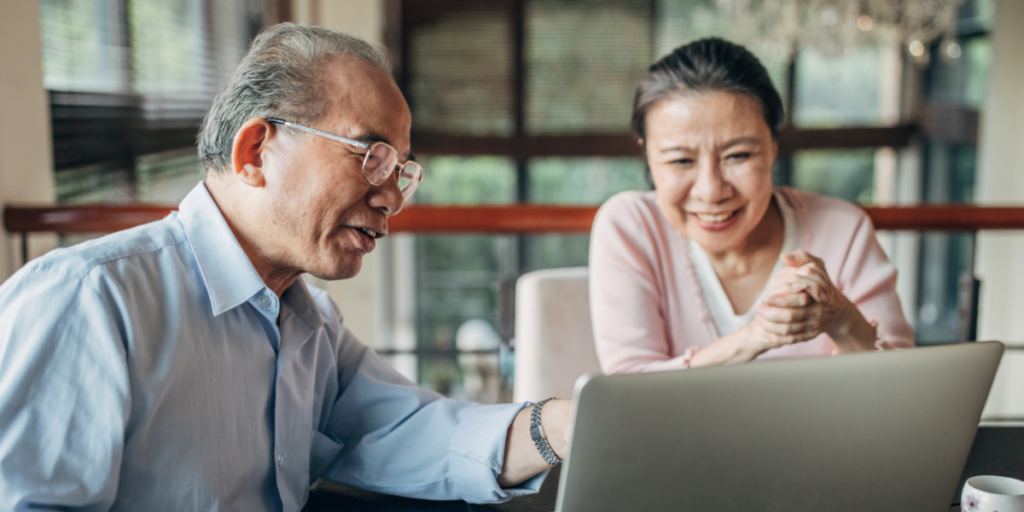 Couple looking at laptop