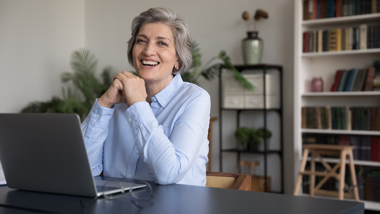 Margaret sitting in front of her computer