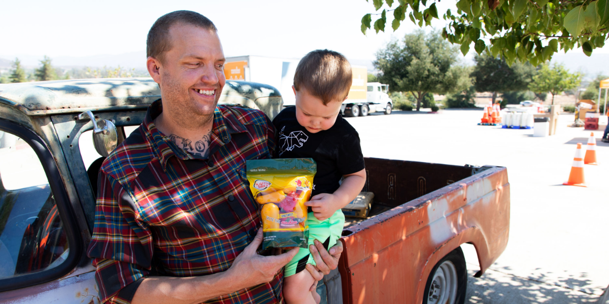 Father and child with peppers