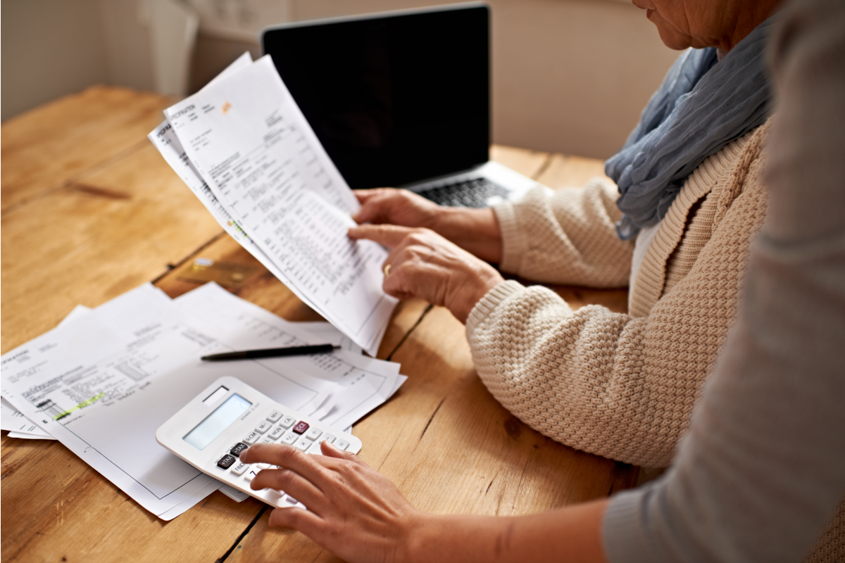 Close-up of couple looking at paperwork