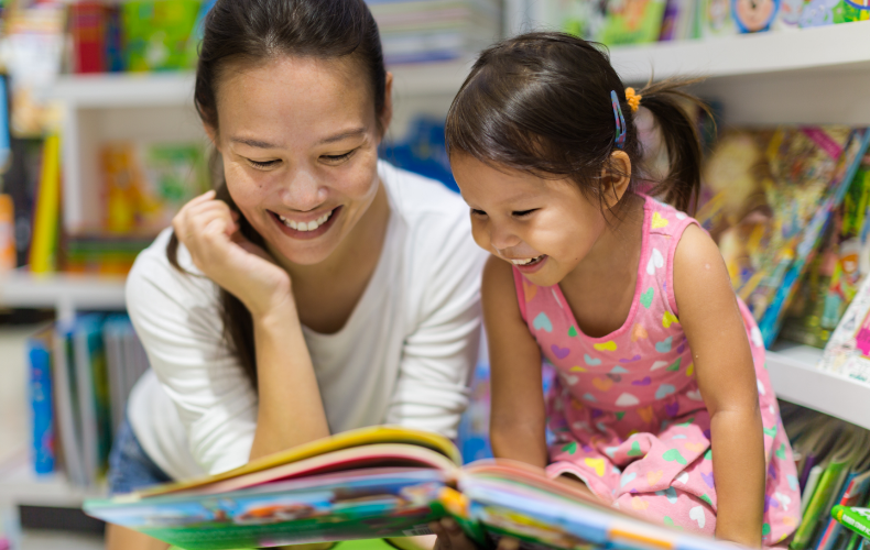 Mother and girl reading
