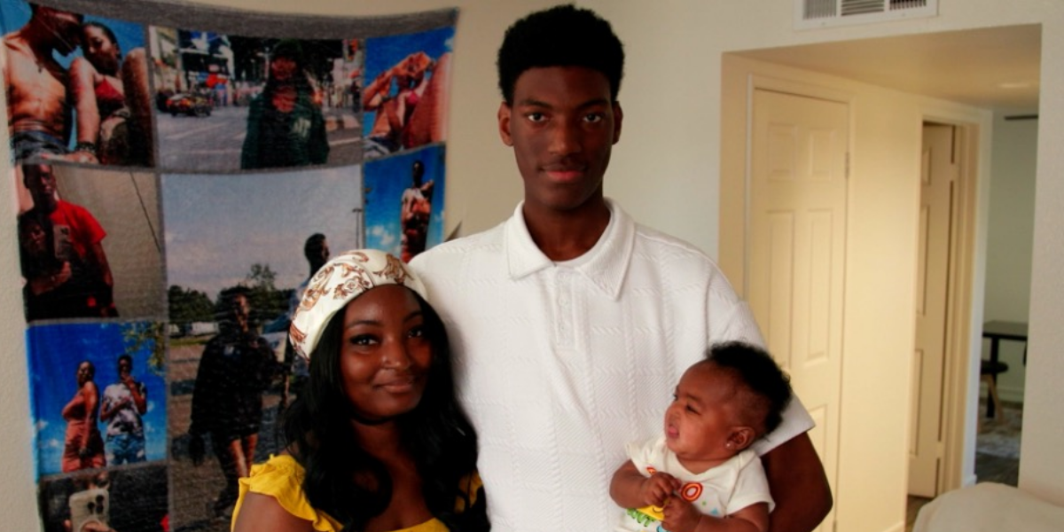 Rebecca, her partner and her daughter Adaeze