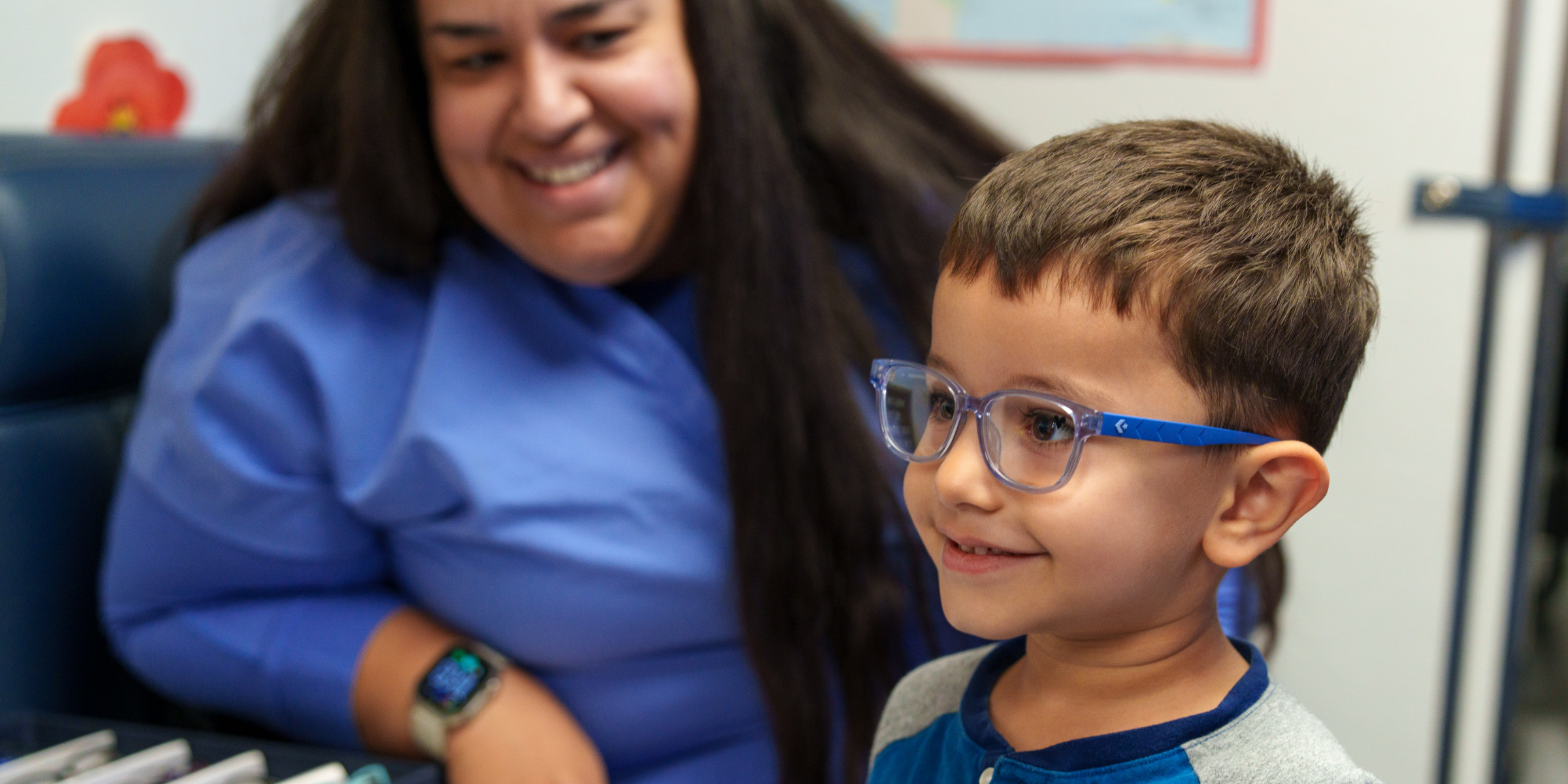 Young patient wearing his new glasses