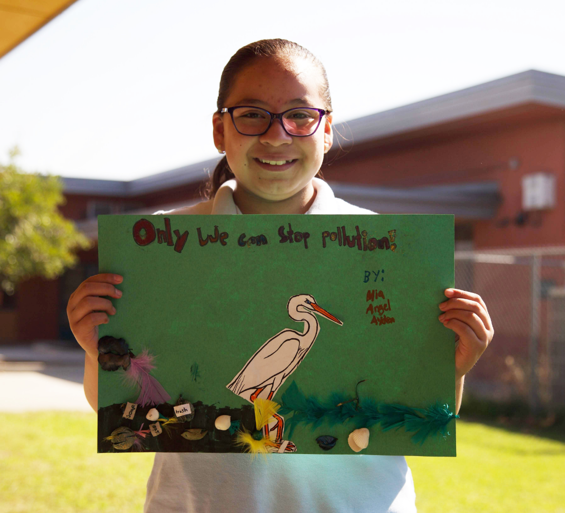 Young girl with drawing