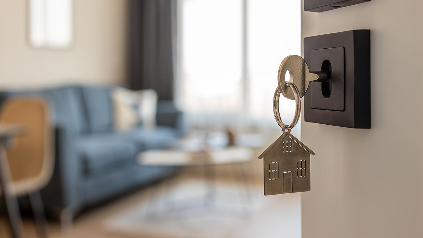 New house key in door